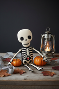 Hey Pumpkin Mr. Bones Jr. Panel lifestyle photo — finished skeleton doll with Halloween styling