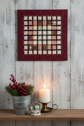 Christmas Window Quilt Pattern lifestyle photo — cozy farmhouse Christmas styling
