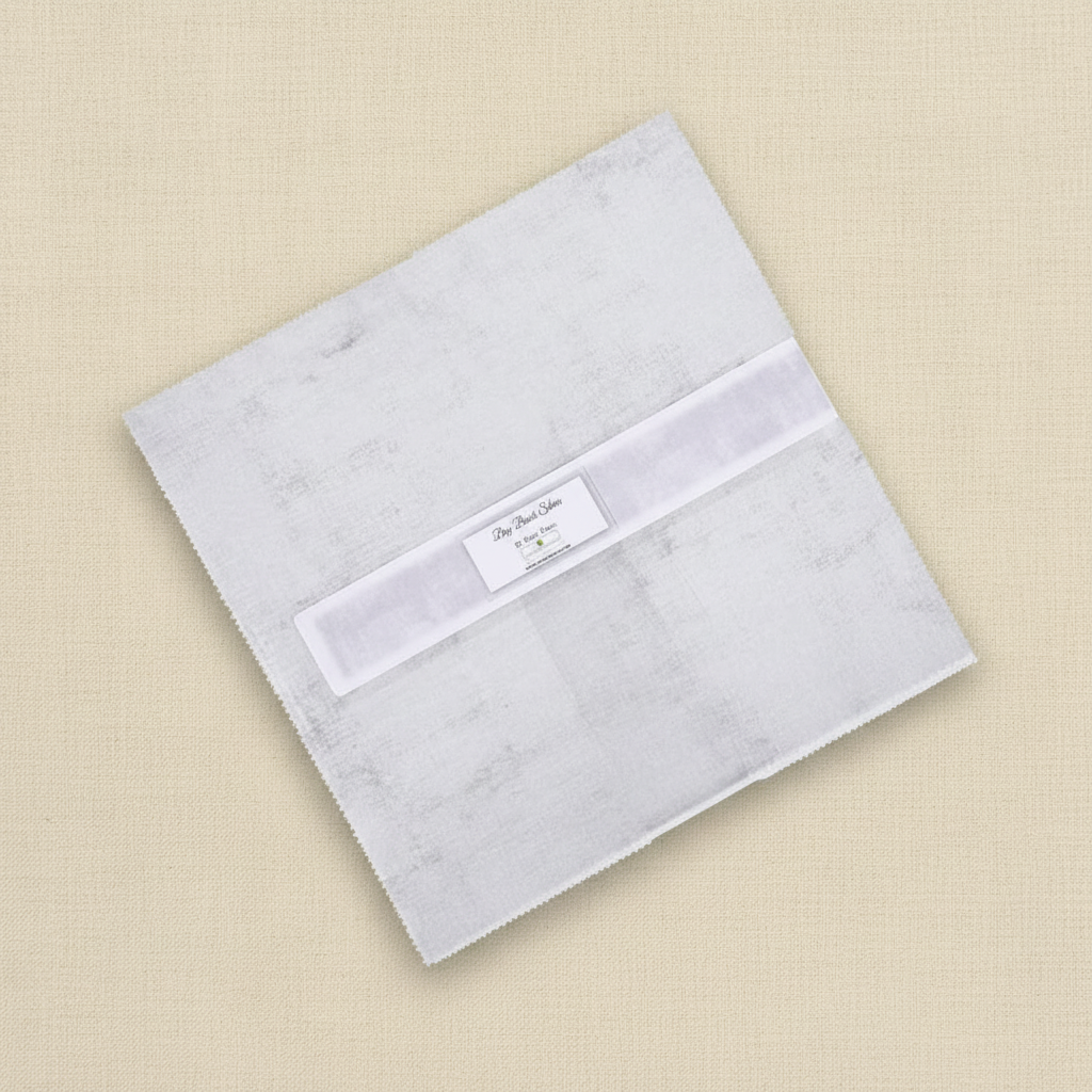 Silver Essentials Dry Brush Layer Cake by Wilmington Prints - stack on warm parchment background