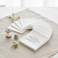White Bella Solids Charm Pack lifestyle photo — elegant sewing room styling